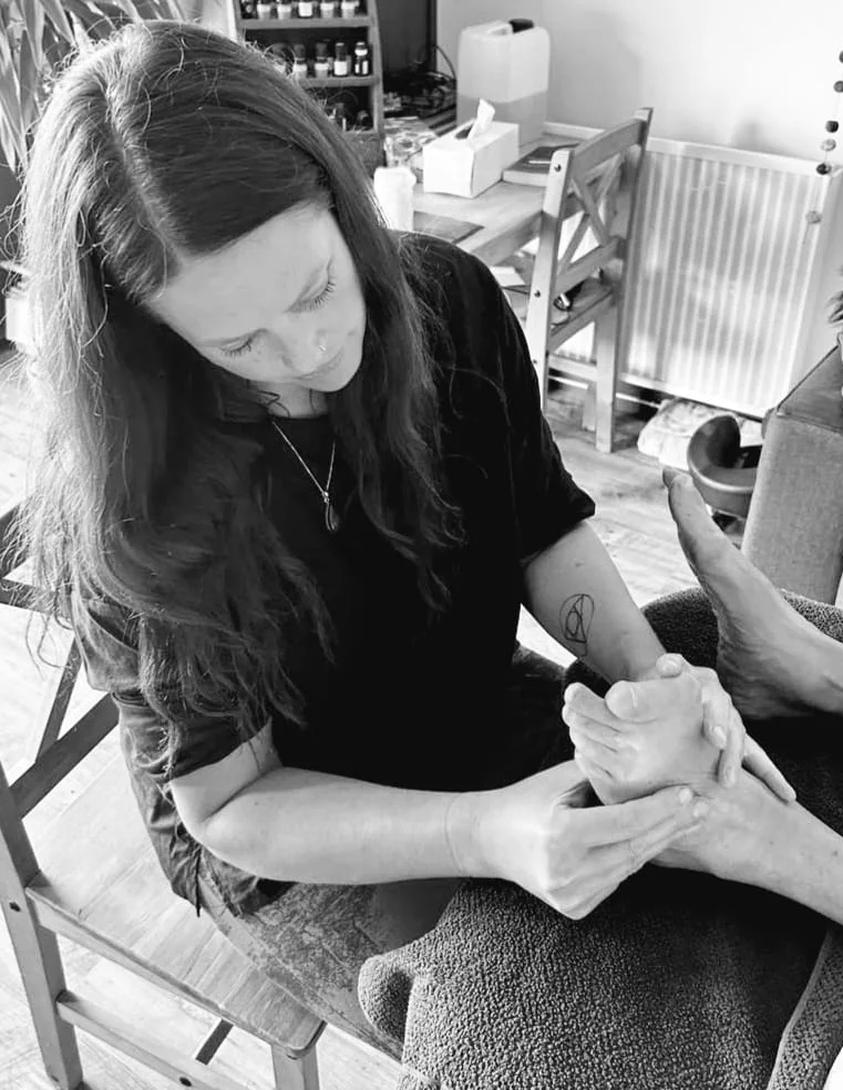 Louise giving a reflexology treatment