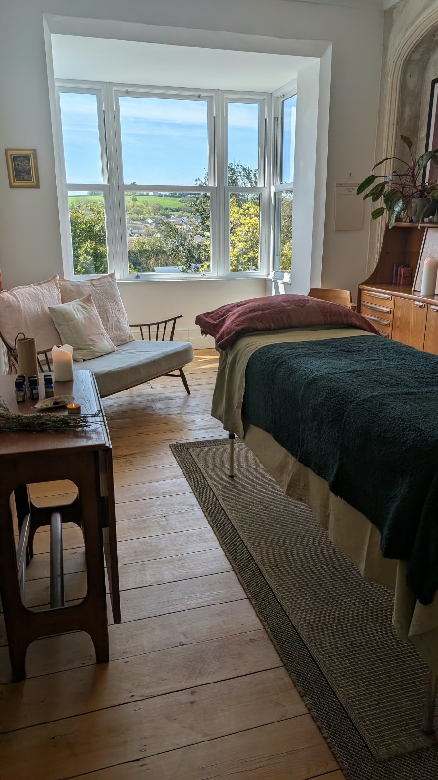 A calm massage treatment room in Pembroke